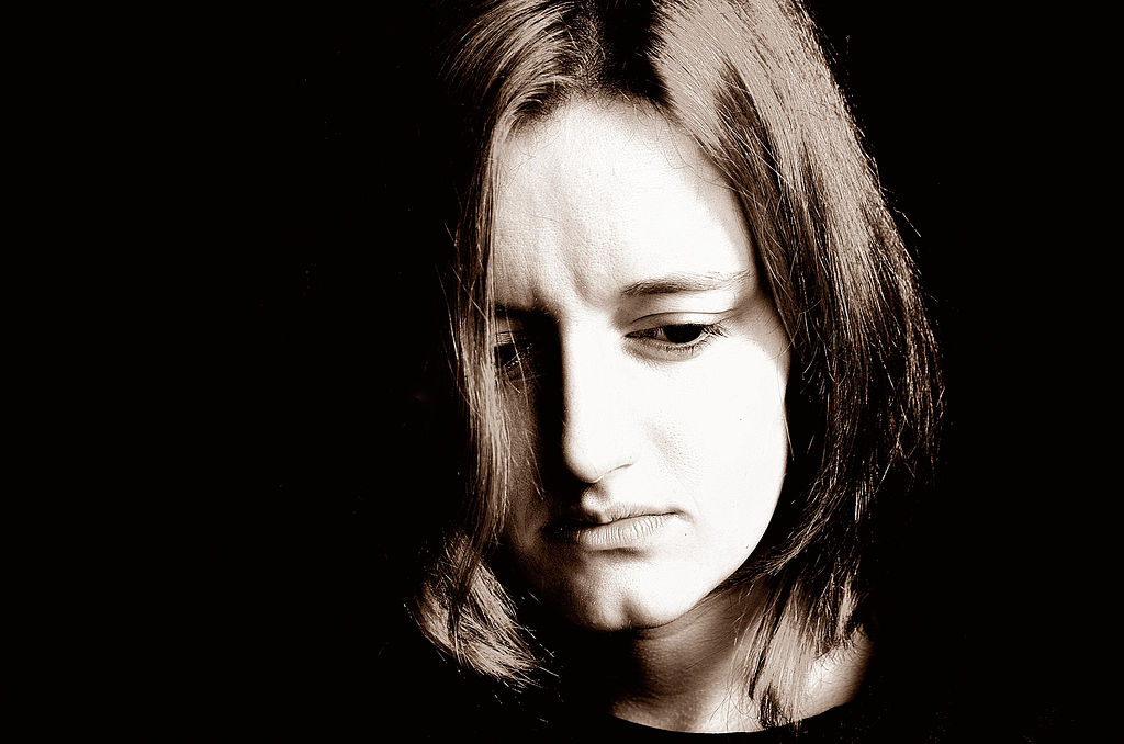 Image of a woman sad expression